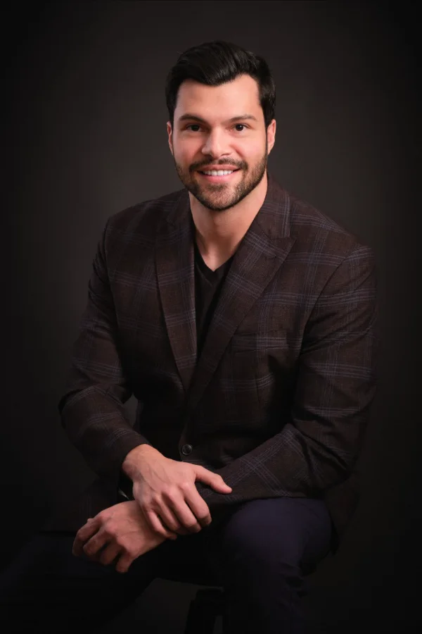 Professional headshot of Murilo Tavares, owner of Rank My Business